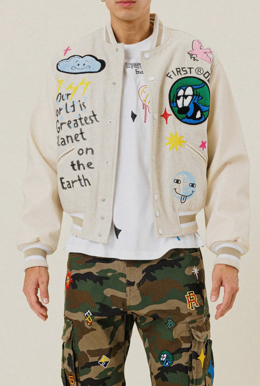 “Our world is the greatest” varsity jacket